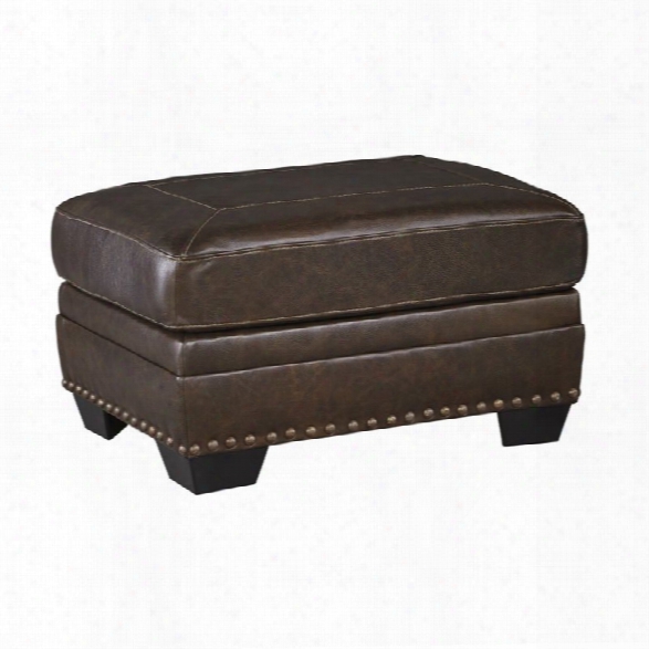 Ashley Corvan Leather Ottoman In Antique