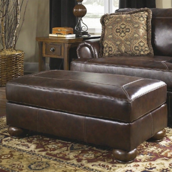 Ashley Furniture Axiom Leather Ottoman In Walnut