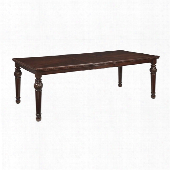 Ashley Leahlyn Extendable Dining Table In Reddish Brown