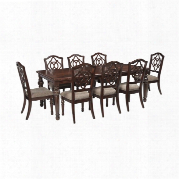 Ashley Leahlyn 9 Piece Dining Set In Reddish Brown