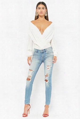 Distressed Low-rise Skinny Jeans